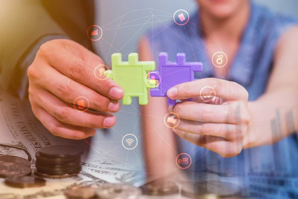 Partnership e Collaborazioni Strategiche - Due persone che tengono in mano un tassello del puzzle