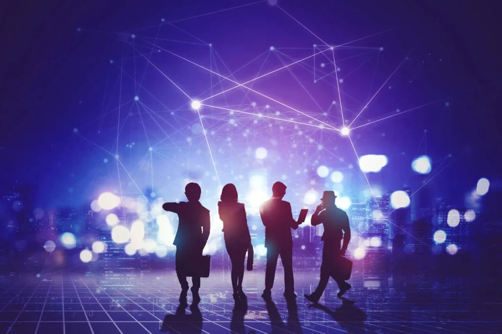 Network Marketing. Costruire Rete e Relazioni 9 Network Marketing gruppo di persone che guarda la città illuminata