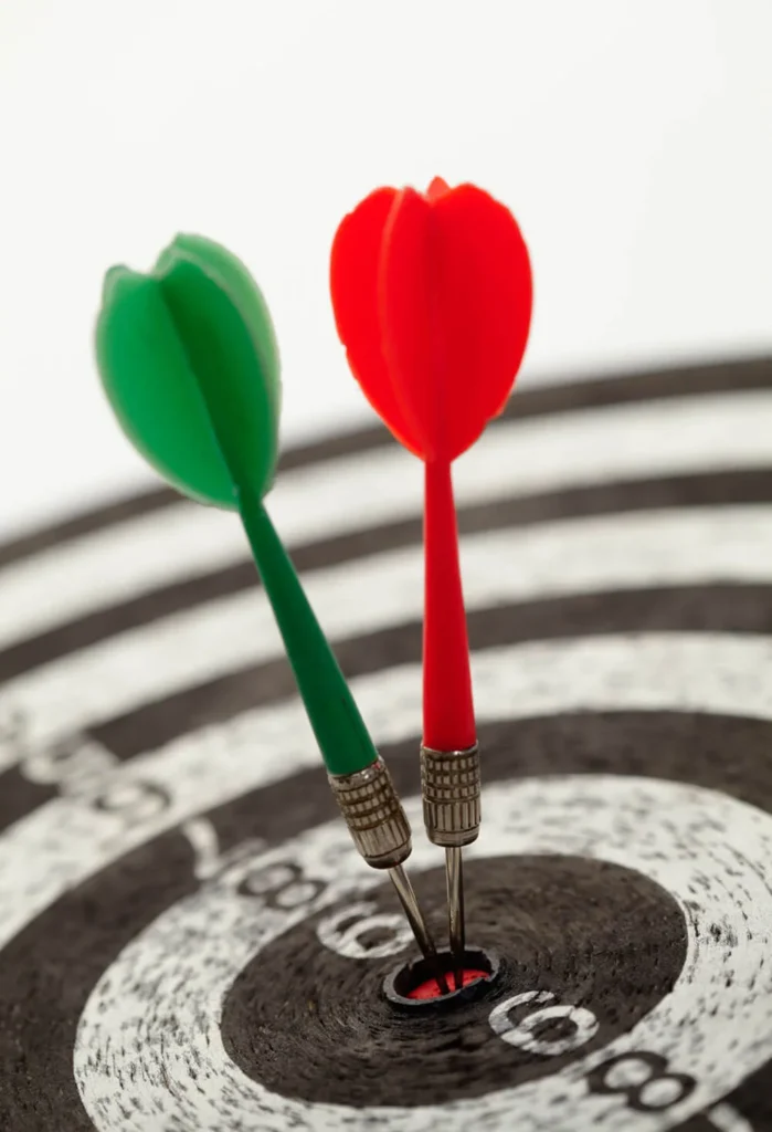 Brand Positioning 2 freccette piantate in centro del bersaglio