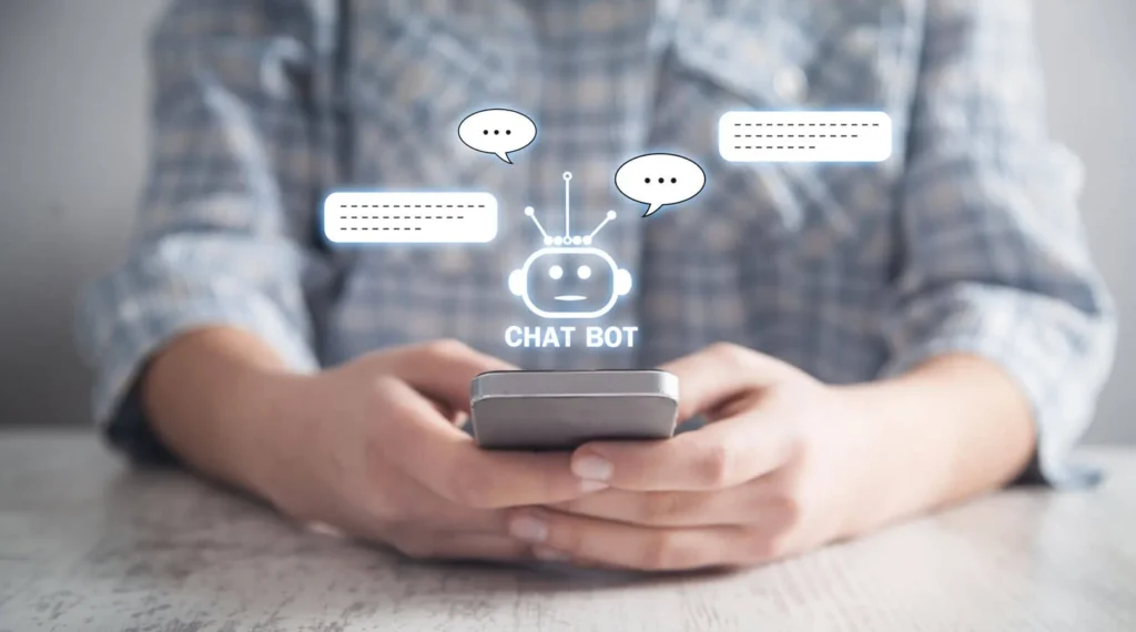 Chatbots e Assistenza Clienti 7 Chatbots e Assistenza Clienti ragazzo con cellulare e icone sul fronte