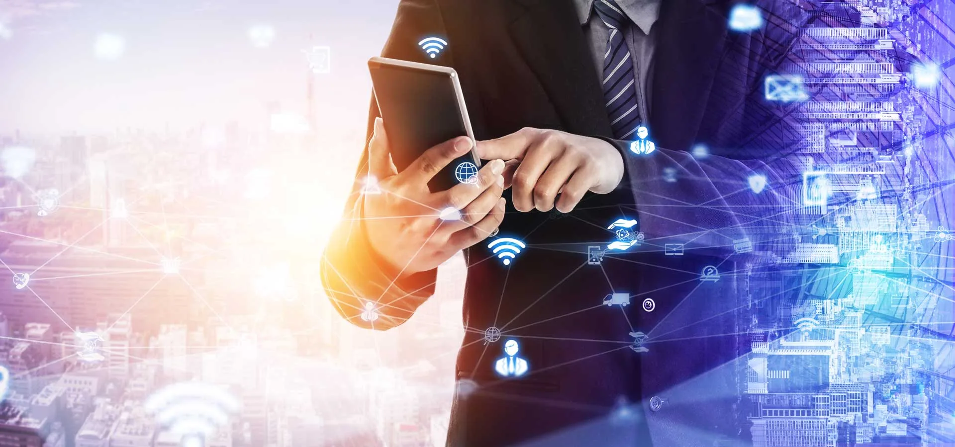 Implementare la Digitalizzazione 6 Implementare la Digitalizzazione immagine concettuale di un uomo di affari con cellulare in mano e icone luminose in primo piano