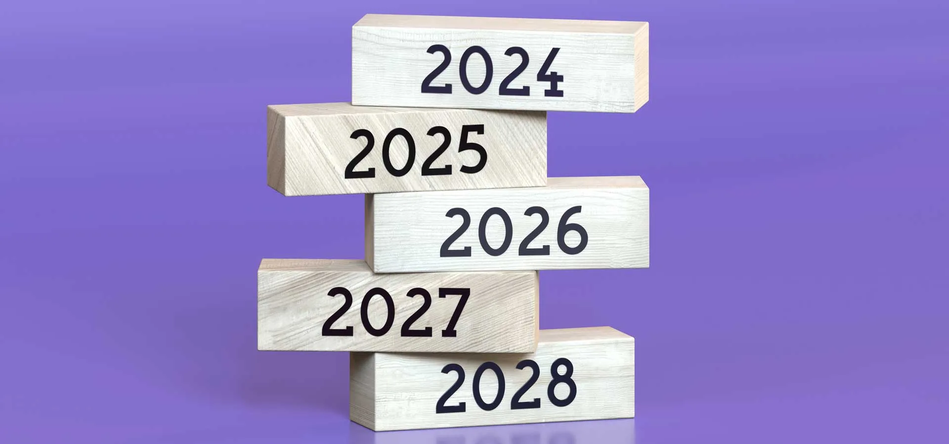 Previsioni e Strategie 11 Previsioni e Strategie per il Nuovo Anno 2025 cubetti in legno con incisi gli anni