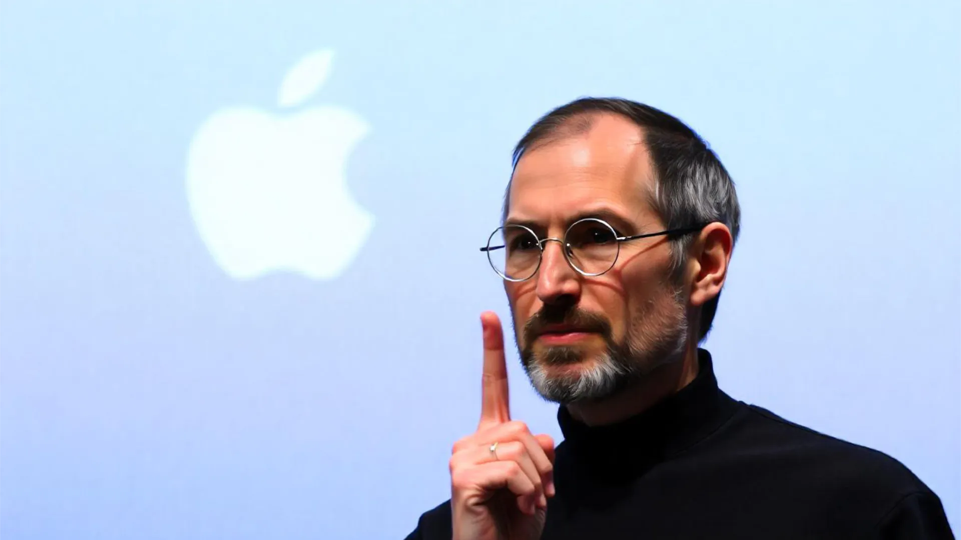 Il Marketing di Steve Jobs 1 Il Marketing di Steve Jobs che spiega con il logo Apple alle spalle